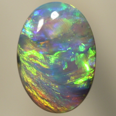 SOLID CRYSTAL OPAL Green and orange fire moves from side to side